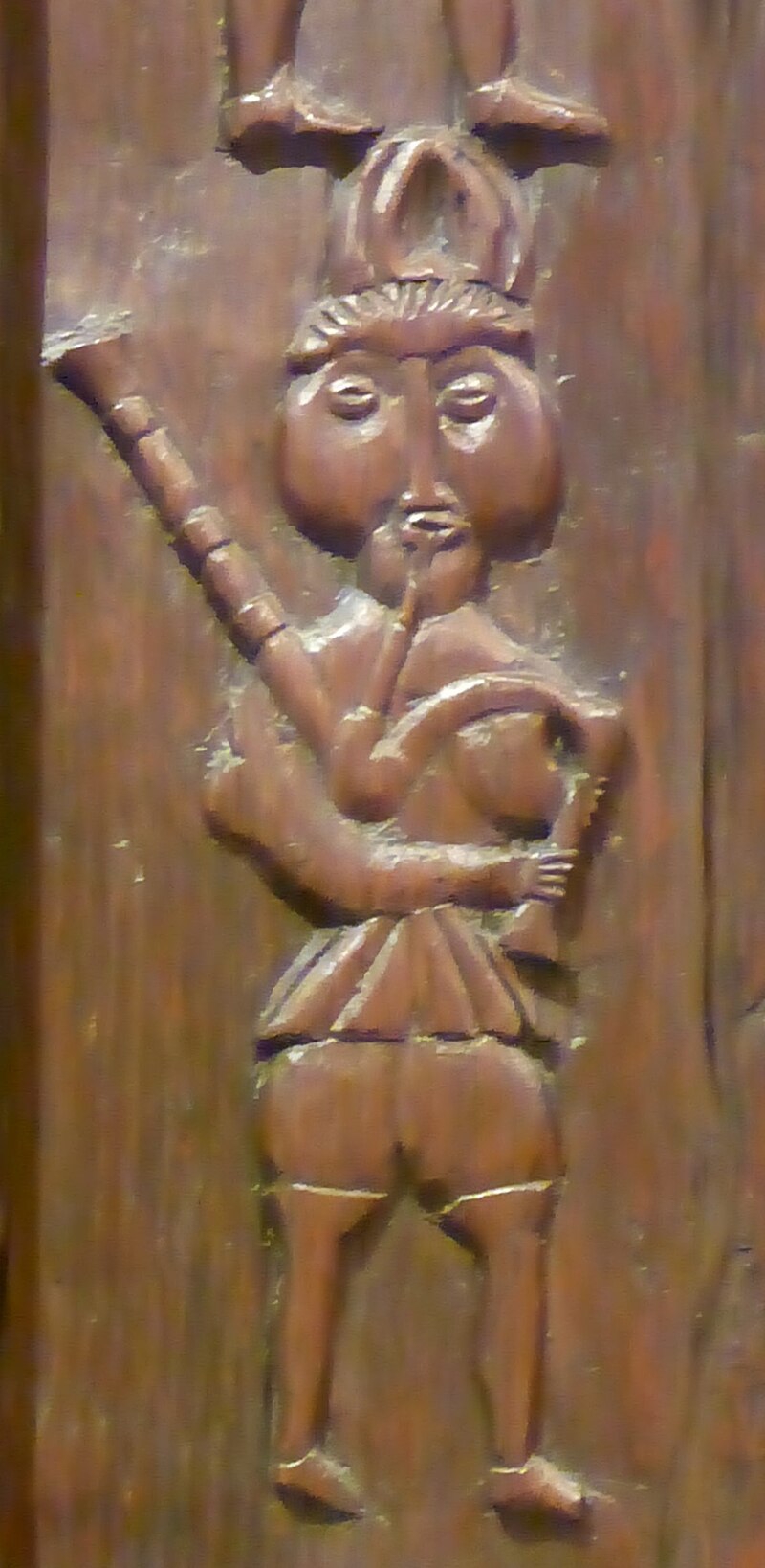 Bagpiper carved around 1600