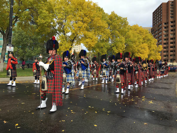 Calgary Police Service Pipe Band marching in a parade