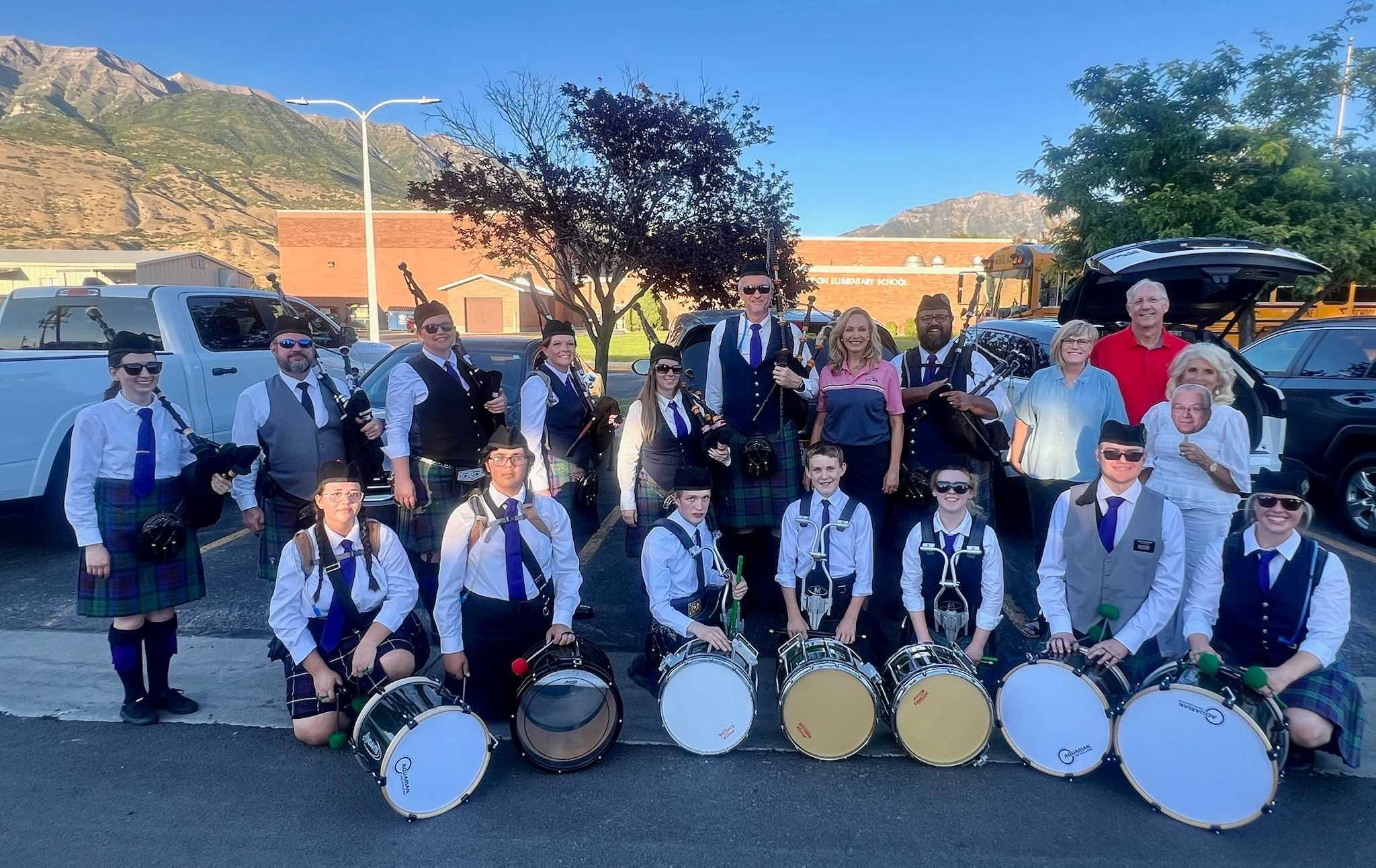 Garden Valley Pipe Band members posing with their instruments