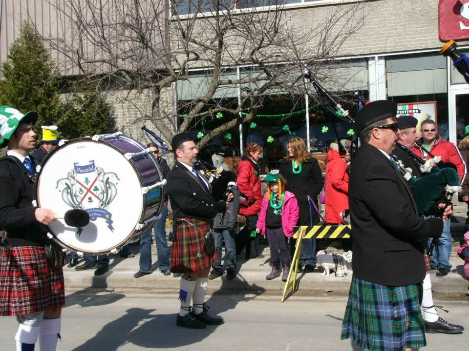 Montréal Pipes and Drums performing in a street parade