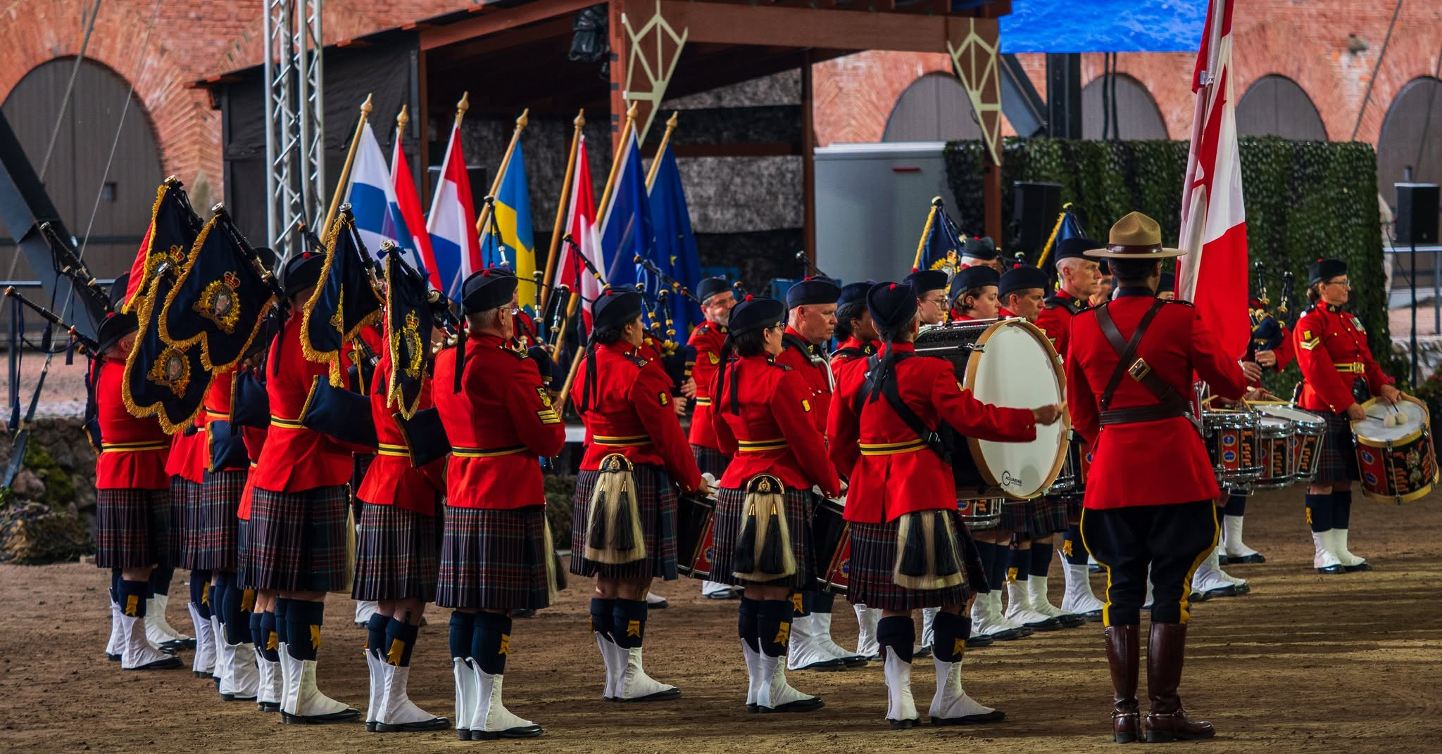 RCMP Pipes and Drums performing in red serge uniforms