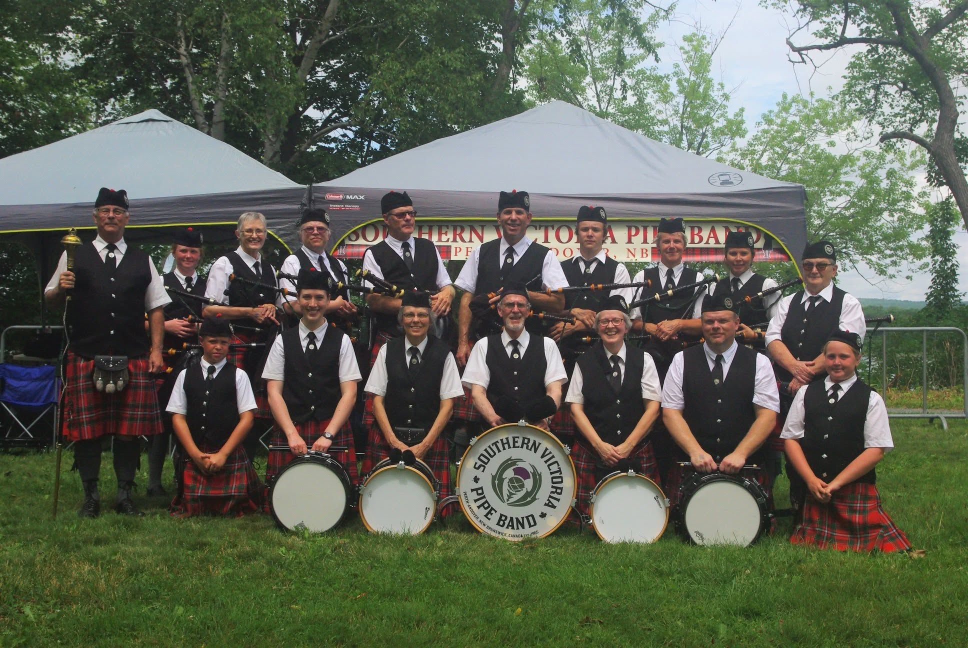 Southern Victoria Pipe Band gathered with pipes and drums outdoors